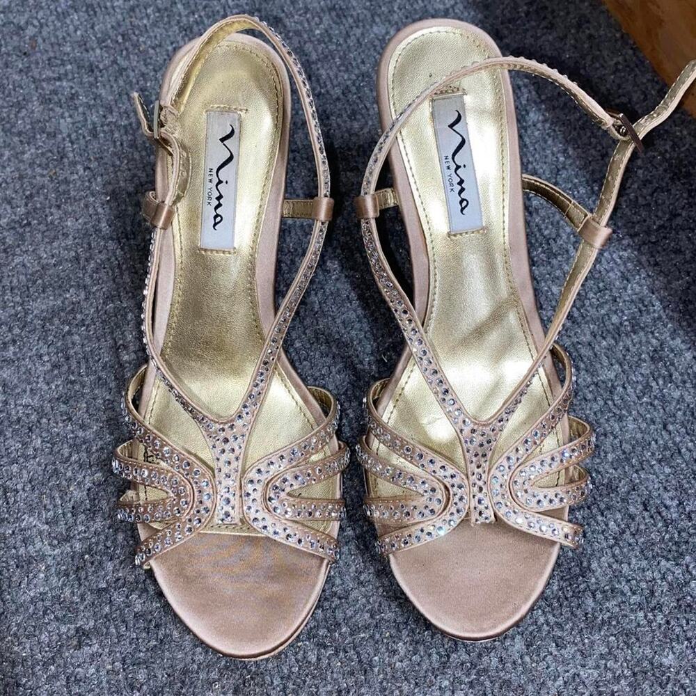 Gold strappy high heels